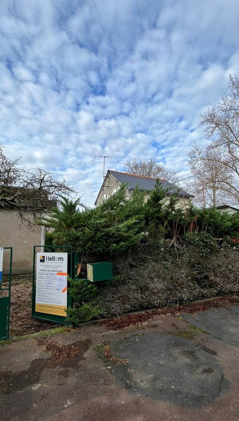 pose panneau permis de construire pour rénovation complète à Saumur